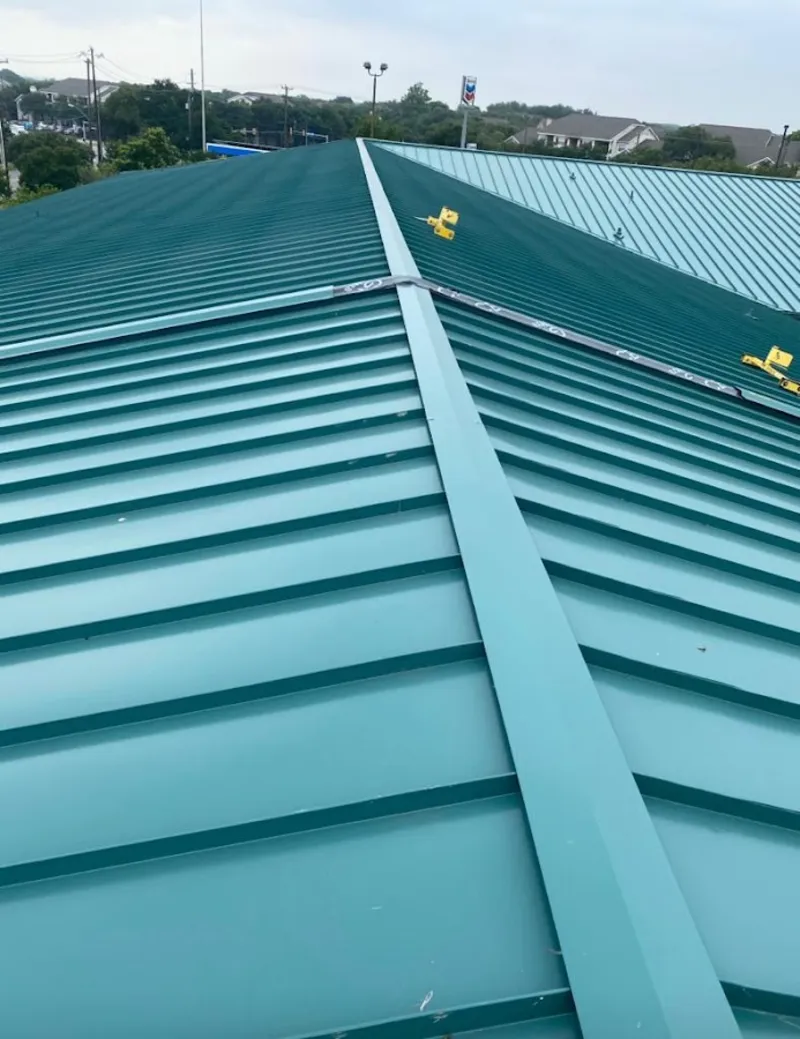 Green commercial metal roof ridge and valley for Metal Roof Repair in Waterloo