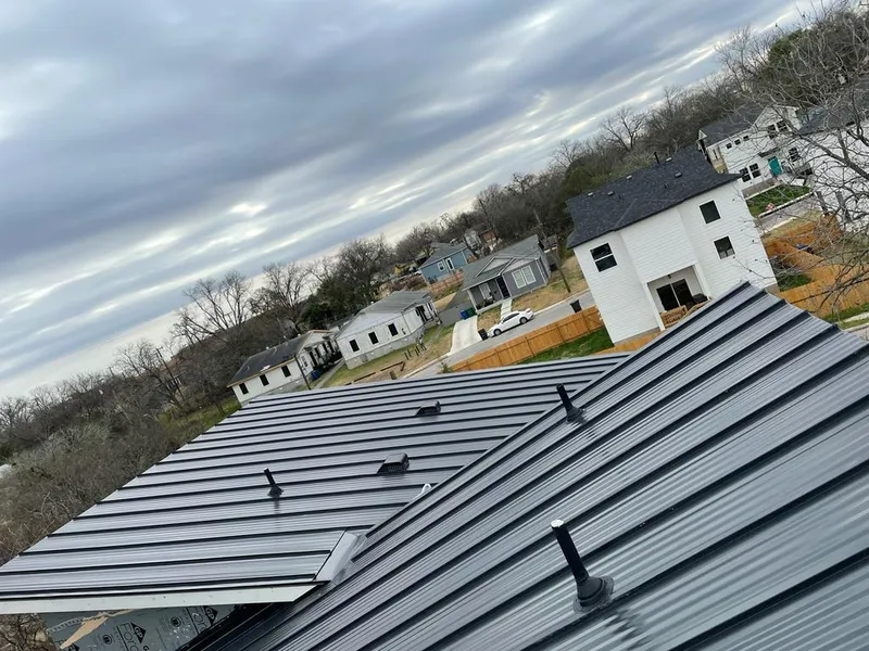 Standing seam metal roof panels with vents for Skylight Repair in Waterloo